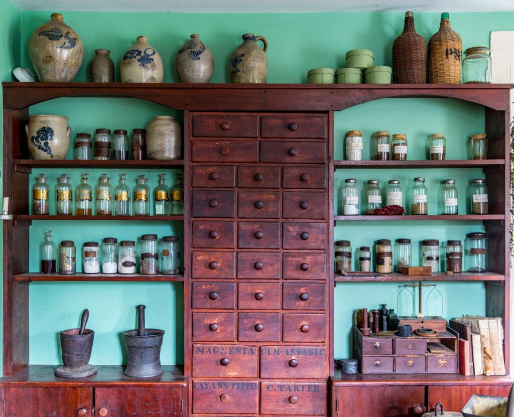 home apothecary with essential oils, homeopathic remedies, cell salts, flower essences, and plant medicine. Learn how to start building your wellness sanctuary with intentional healing tools for mind, body, and spirit.